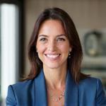 Portrait de la fondatrice, souriante et professionnelle